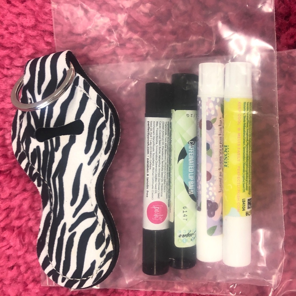 Perfectly Posh lot of 4 RETIRED LIPBALMS & 1 Zebra Lip balm holder.